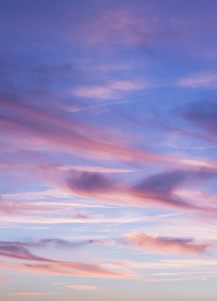 istock Sky with clouds in blue and pink sunset evening colors 518675751