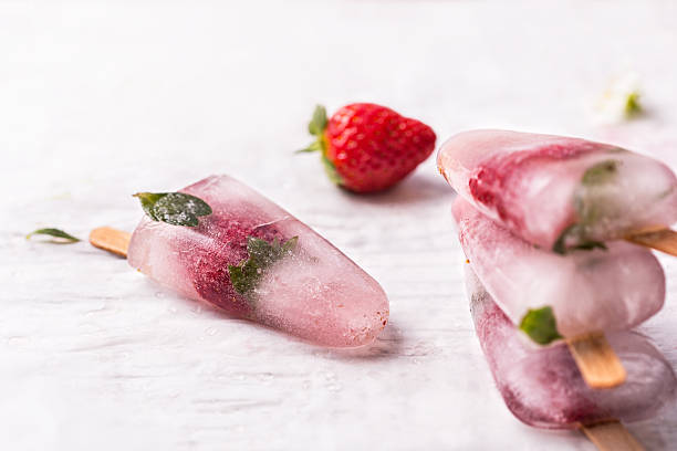 istock homemade strawberry ice pops 518676550