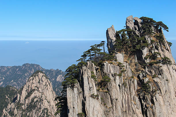istock Huangshan mountain top with blurry background 518677394