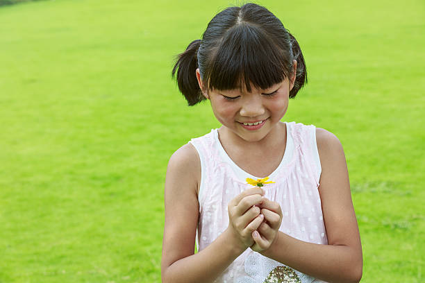 istock happy Oriental little girl lovely expression 518678164
