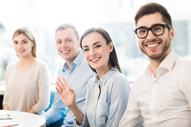 istock Pleasant colleagues sitting at the table 518678512