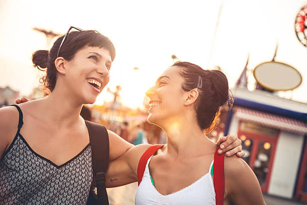 istock Two friends at amusement park 518681705
