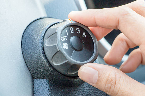 istock Air conditioner knob on a car's console 518681894