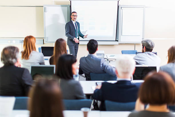 istock Business people in education room listening lecture,working with computers 518686060
