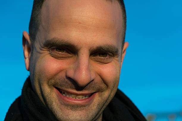 istock Portrait of happy man looking at camera 518687442
