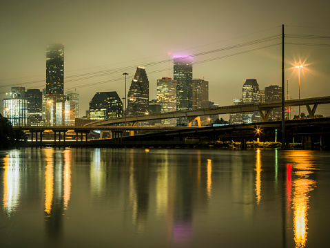 Downtown Houston flooding at night, Texas, USA.