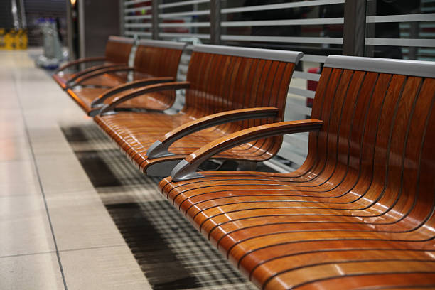 Waiting room (departure lounge) with passengers in the airport