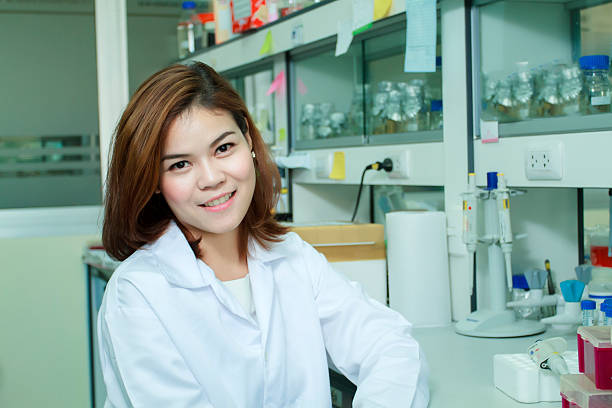 istock Young female tech or women asia scientist working with multichan 518700144