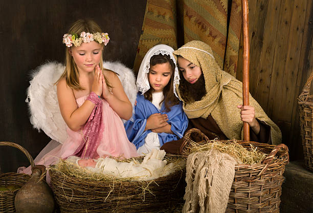 istock Little angel in nativity scene 518701633