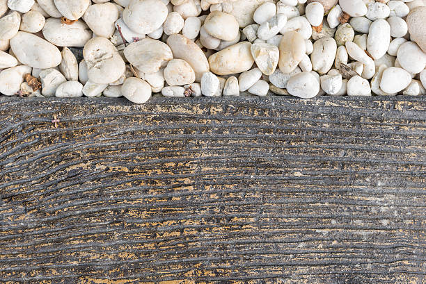 istock wood and rock texture for background with copy space 518704318