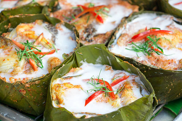 istock Colorful and tasty steamed seafood in curry coconut paste 518704556