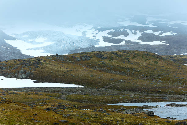 istock Summer mountain with lake and snow (Norway) 518705225