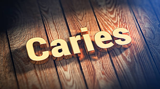istock Word Caries on wood planks 518708836