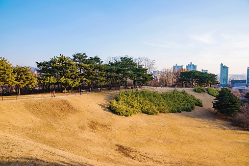 Seoul Olympic park on a bright sunny day with people walking