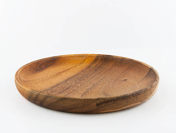istock Wooden plate isolated on white background. 518710838