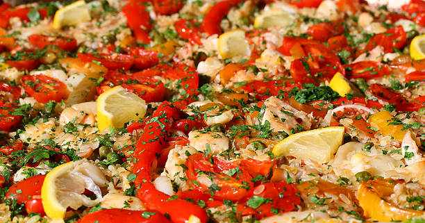 istock paella valenciana with seafood and vegetables 518717561