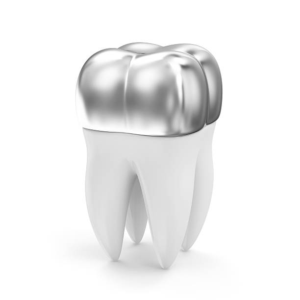 istock Silver Dental Crown on a Tooth isolated on white background 518719059