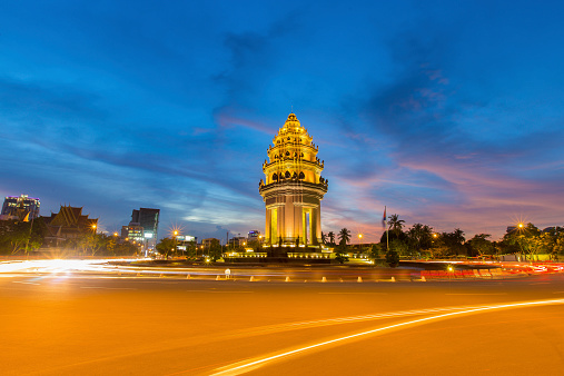 night view of traffic drives around the Independence Monument in downtown Phnom Penh, Cambodia.