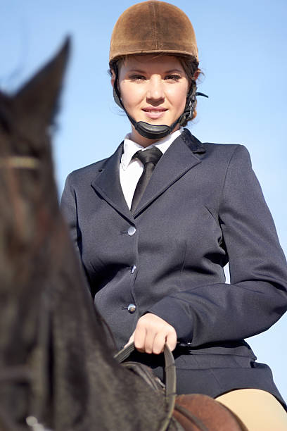 istock She's positive about her horse 518720433