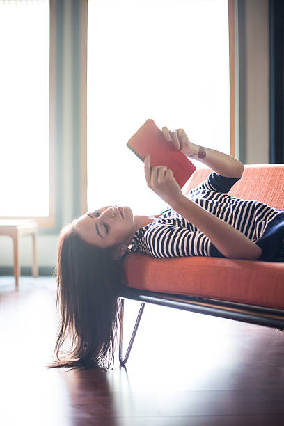 istock Young Woman Reading A Digital Tablet 518724095