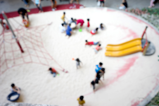 blur child play in playground outdoor shopping mall