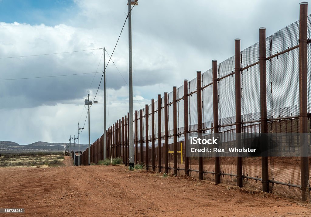 Border fence at Naco Arizona Fence at Mexico United States border in Naco Arizona Geographical Border Stock Photo