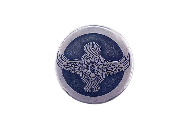 Photo of angel symbol on a silver pendant