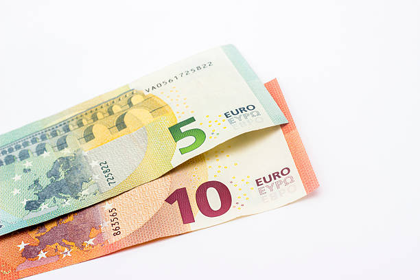 istock High angle view of five and ten euro banknotes 518730630