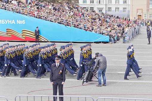 Samara, Russia - May 9, 2015: Russian woman midshipmans march at the parade on annual Victory Day