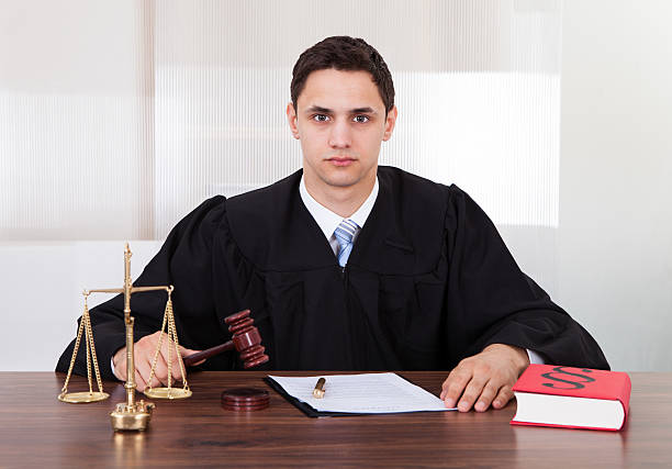 istock Confident Judge Sitting In Courtroom 518733093
