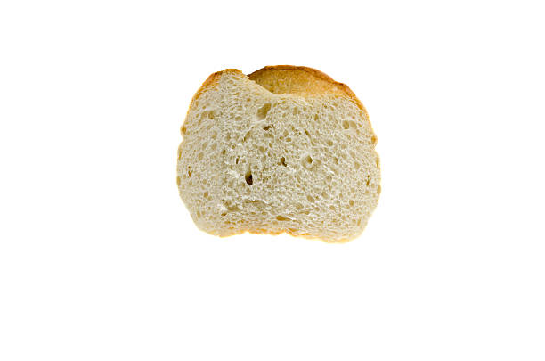 istock Section of bread isolated on white 518733937