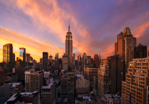 Colorful sunset over manhattan skyline, New york