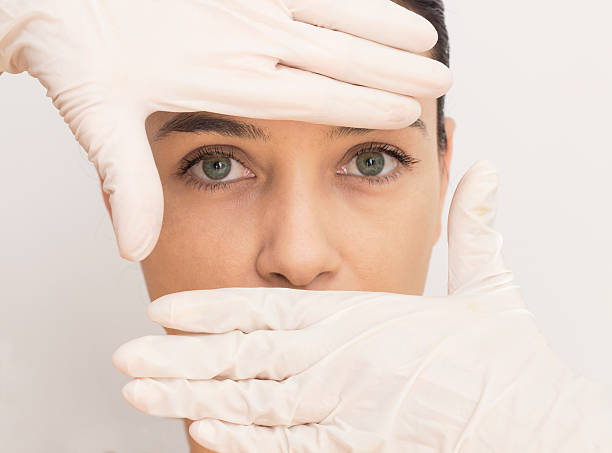 Surgery Woman frames view with hands. determination focus the bigger picture human hand stock pictures, royalty-free photos & images