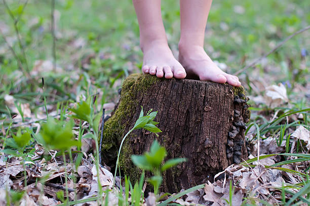istock Close up of bare feet running 518736089