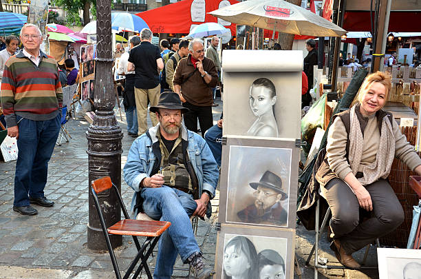 Paris, France - September 24, 2011: Artists display their work in Montmartre. Montmartre in Paris is place, where many notable artists lived and worked.