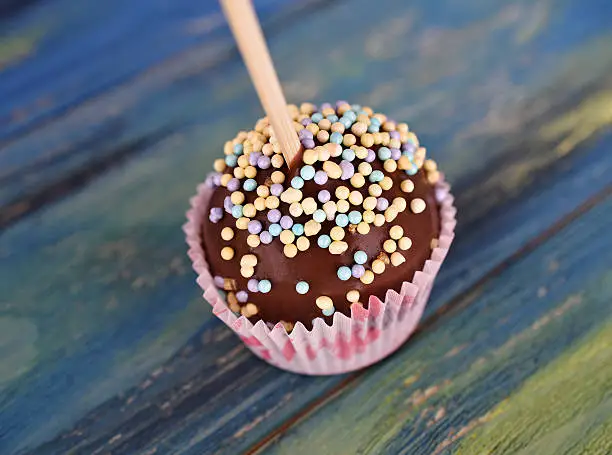 Photo of CAKE POP - mini cake on a stick, close up