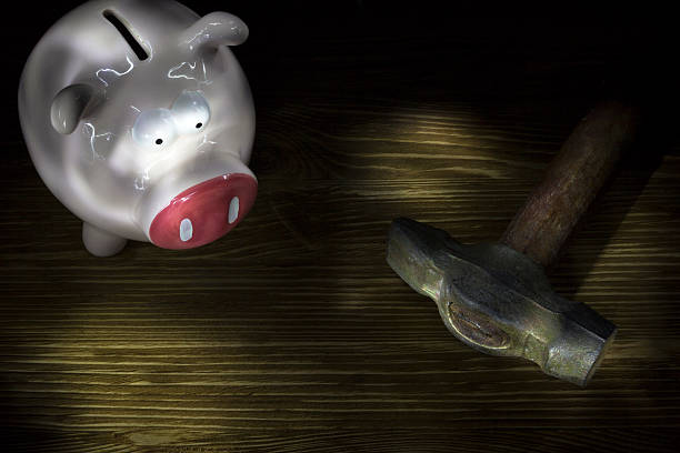 istock pig moneybox and hummer 518738522