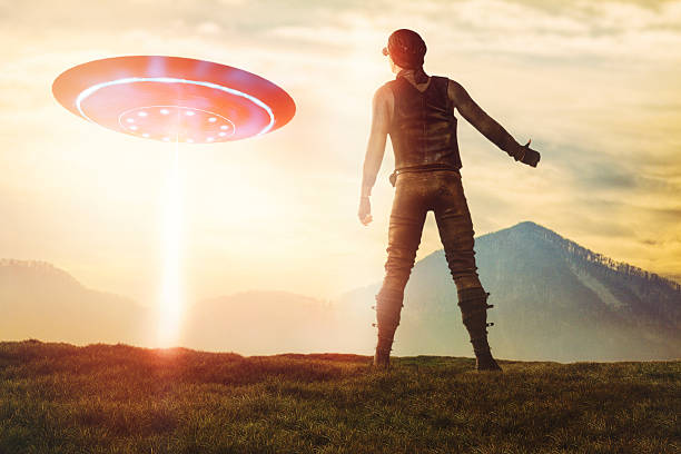 istock Man hitchhiking UFO 518738868
