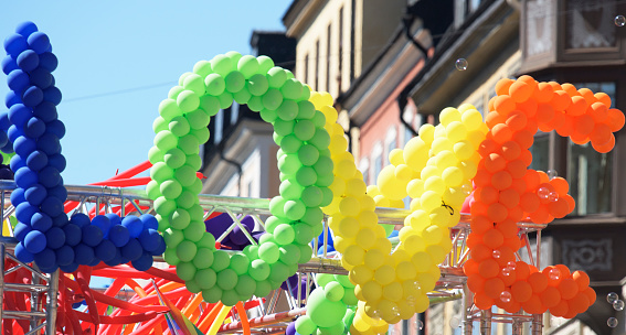 Stockholm, Sweden - August 1, 2015: LOVE written with balloons by participants in Stockholm Pride Parade 2015