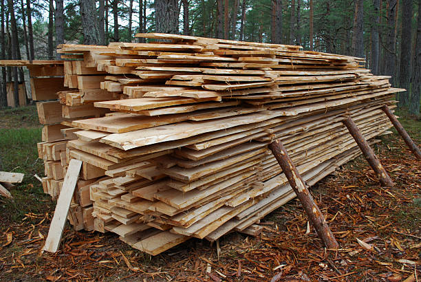 istock Wooden raw planks, folded for drying. 518739868