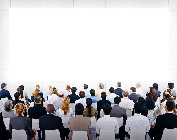 istock Group of Business People Looking at Blank Presentation 518752299