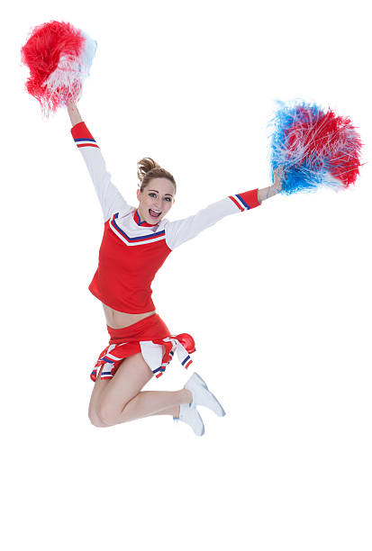 istock Happy Young Cheerleader Jumping With Pom-poms 518752653