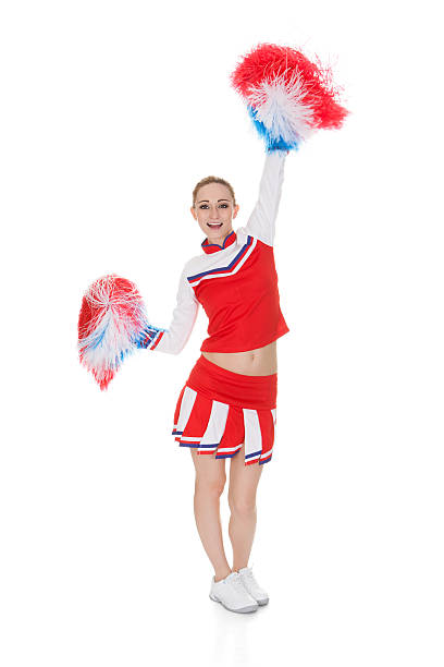 istock Young Cheerleader Holding Pom-poms 518754183