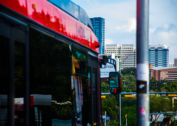 istock The City Bus Pulling away from a Bus Stop 518754969