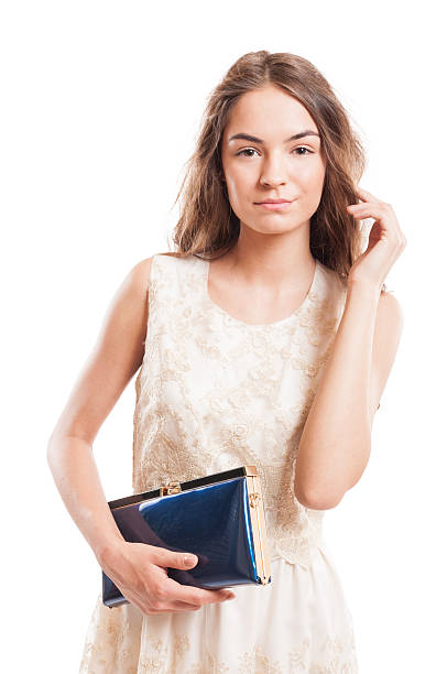 istock Young female model touching her natural long hair 518755433