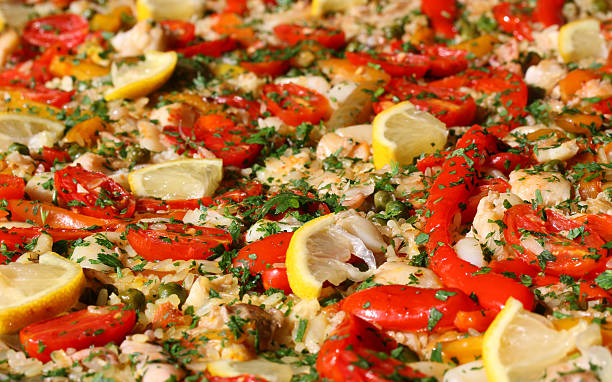 istock paella valenciana with seafood and vegetables 518757717