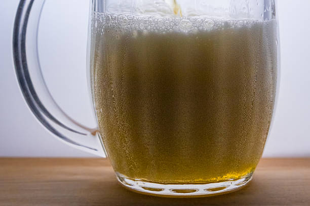mug with light beer pour