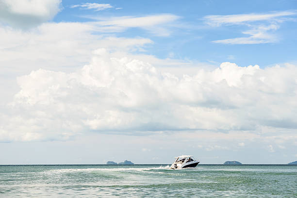 istock Luxury private speed boat floats in the sea 518760600