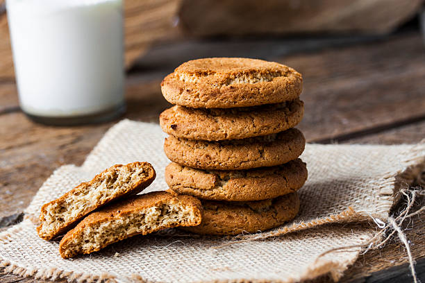 istock oatmeal cookies and a glass of milk 518760708