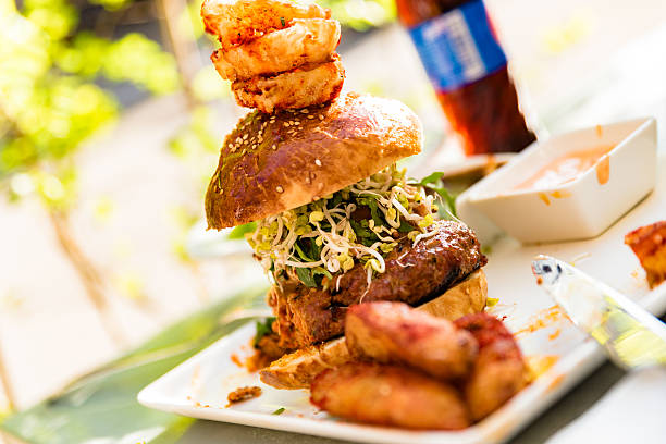 istock Hamburger with potatoes and fresh salad 518760840